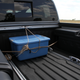 Putting the bed’s tie-down system to good use with a heavy box that didn’t budge an inch.